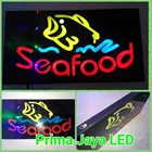 A Seafood Restorant Sign Lights 1