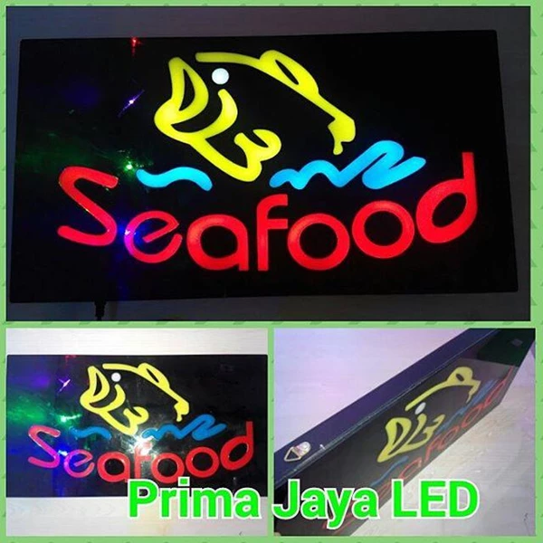 A Seafood Restorant Sign Lights